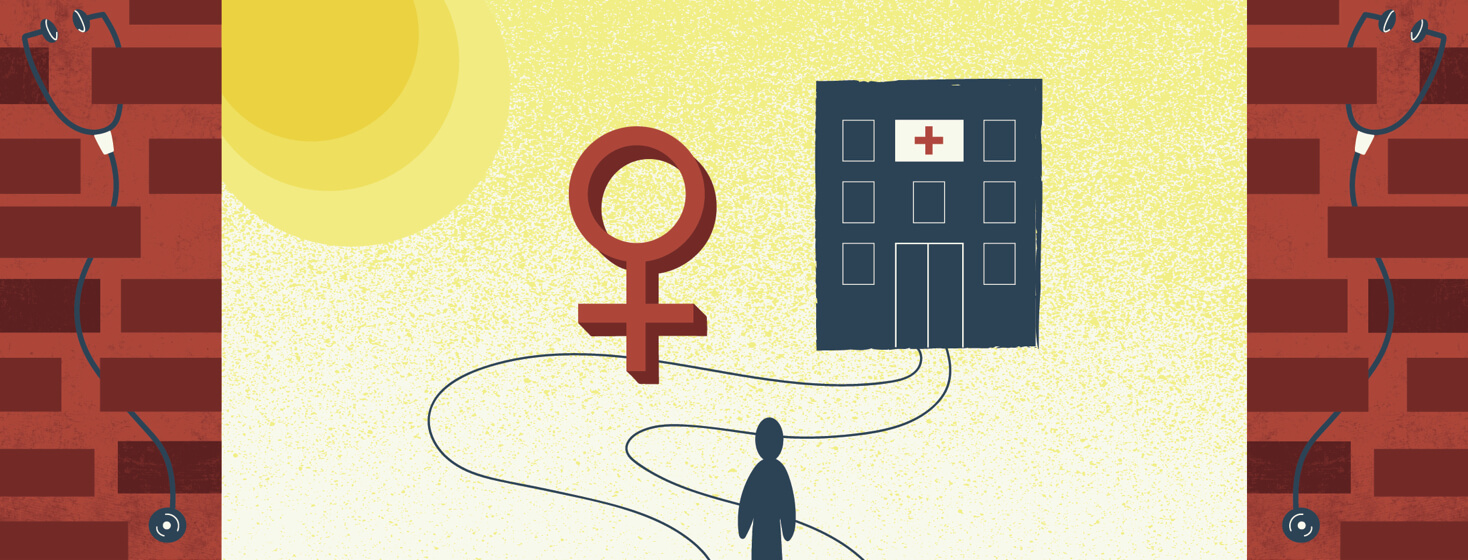 a women's gender sign blocking the path of a person on their way to the doctor