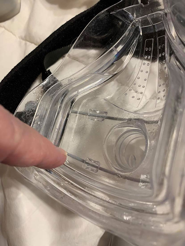 Forma full face mask, clear with chin shelf pointed out.