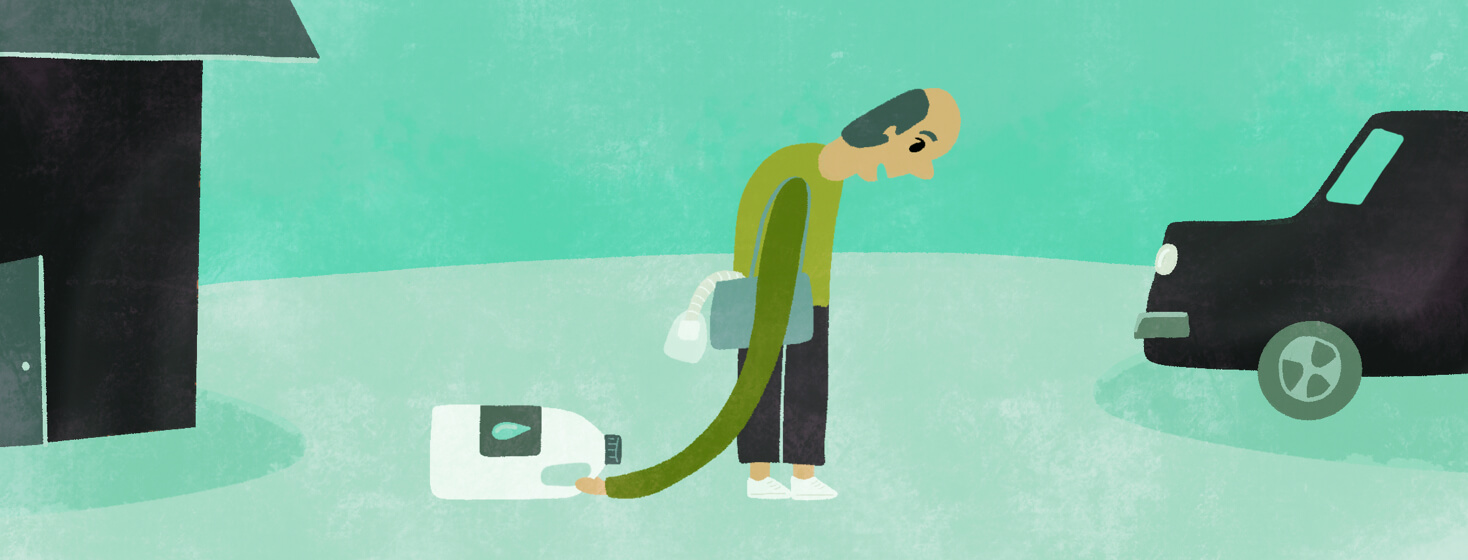 a man lugging a gallon jug of distilled water to his car from his house for the CPAP machine in his bag